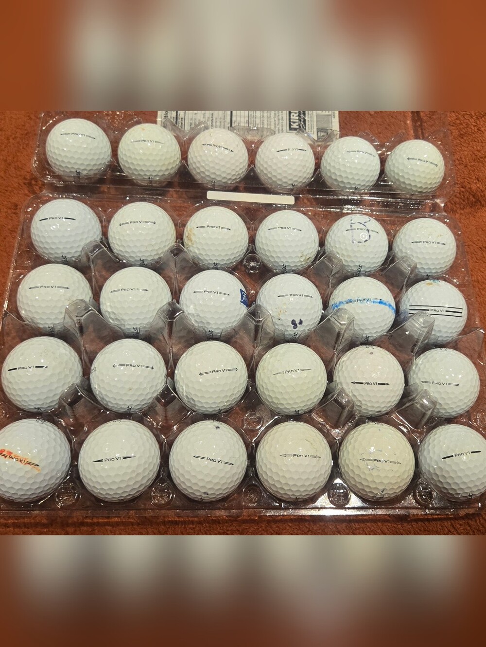 30 Titleist ProV1 White Golf Balls In Fair To Good Playing Condition.
